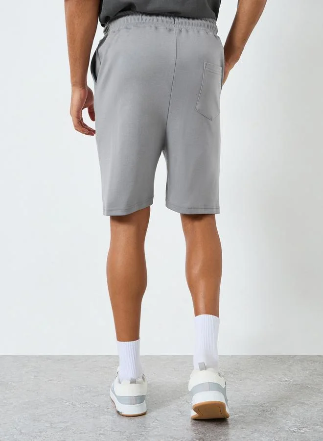 Styli  Men Grey Oversized Shorts with Drawstring for Men | Best Price UAE